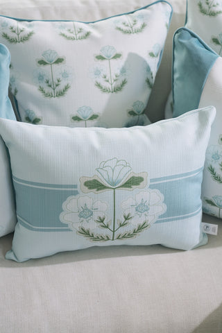 The Bee & Florals Collection features the Victorian Floral in Blue Pillow with a central flower design in soft blue and white tones, reminiscent of Sewing Down South style, complemented by similarly themed decorative pillows.