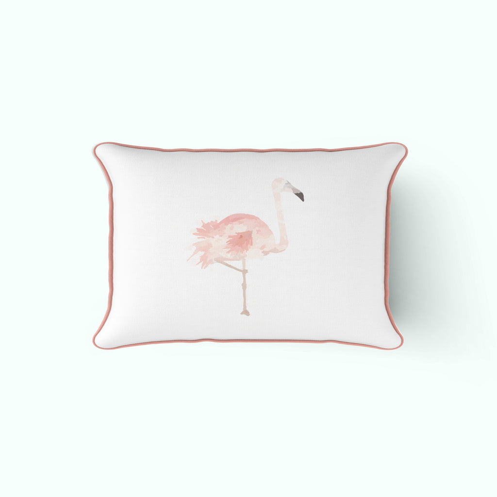 Close-up of decorative throw pillows, including The Flamingo Lumbar Pillow featuring soft pink piping and geometric patterns, arranged on a light sofa for a touch of tropical cheer—an exclusive Sewing Down South design.