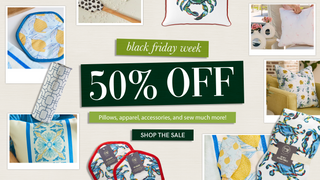 Black Friday sale advertisement with decorative pillows and home decor items.