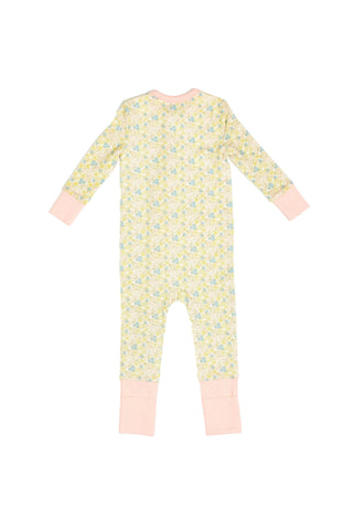 The Precious Petals Dream & Play Zipper Romper features a yellow and blue floral print with light pink cuffs, shown laid flat to display the back. Made from cotton modal for soft baby sleepwear comfort.
