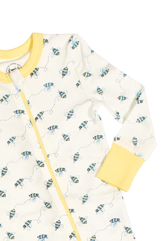 Buzzin’ Around Dream & Play Zipper Romper showcases a blue and yellow bee print, yellow zipper trim, and matching cuffs—an adorable baby outfit displayed on a white background.