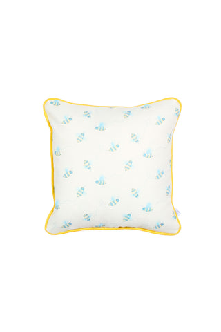 The Buzzin’ Around Children’s Pillow is a square white nursery pillow with yellow trim and a cute blue bee print, perfect for kids’ decor.