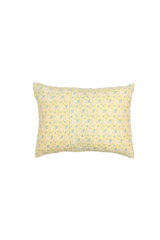 The Precious Petals Children’s Sleeping Pillow Cover is a rectangular decorative pillow cover featuring a subtle yellow and blue floral pattern on a white background, with a double-sided print design and proudly made in the USA, displayed against a plain white backdrop.