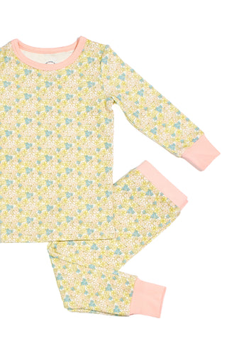 The Precious Petals Dream & Play Two Piece Set—a children’s long-sleeve pajama set with a yellow and blue floral pattern, light pink cuffs and collar, made in the USA—is displayed flat on a white background.