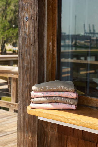 Charleston shirts folded on a window sill