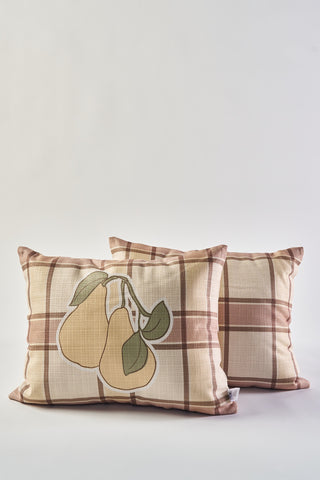 The Fall Pears on Tartan Plaid Lumbar Pillow features a cozy autumn tartan plaid in beige, brown, and cream with an illustration of two yellow pears and green leaves on a plain white background.