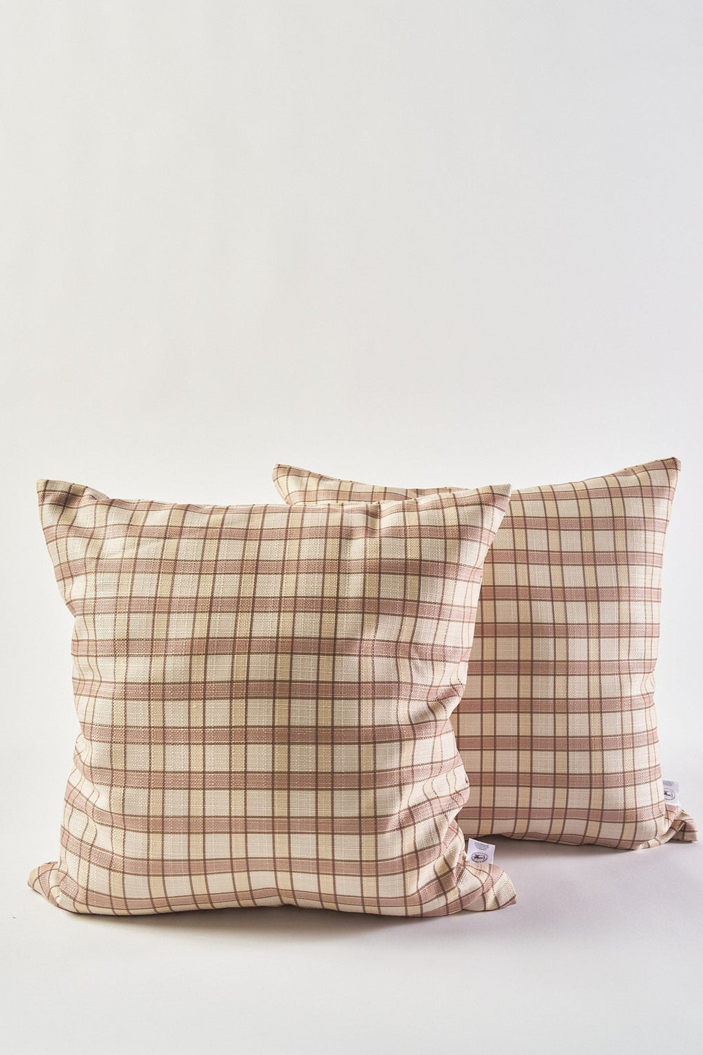 Two square Fall Tartan Plaid Pillows in beige and brown are set against a plain white background, with one placed slightly in front of the other—ideal for cozy autumn decor.