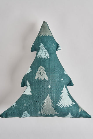 The Festive Tree Shape Pre-Filled Pillow is a polyester accent pillow in teal with white and light blue tree patterns and star designs, displayed on a plain white background.