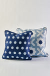 The set includes two decorative pillows: one blue accent pillow with white stars, and the Mod Stars Pillow, which displays blue star shapes and geometric lines on a white background.