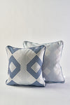 The Mod Geo Diamond in Navy Pillow features bold geometric diamonds in blue and white, adding Southern aesthetic decor to any space when paired with a navy pillow featuring a subtle linear pattern.