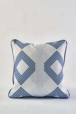 The Mod Geo Diamond in Navy Pillow features a white background with bold navy geometric diamond patterns, vertical light blue center stripes, and dark blue piping—perfect for adding Southern style to your decor.