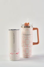 Two insulated cups are shown: a tall white tumbler with pink flamingos, and the Pink Lattice 30oz Tumbler with handle, straw, and geometric design. Both have the Sewing Down South logo and a no sweat exterior.