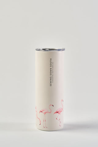 The Flamingo 20oz Tumbler is a white stainless steel tumbler featuring pink flamingos around the base, "SEWING DOWN SOUTH" vertically near the top, a No Sweat Exterior, and a clear plastic lid.
