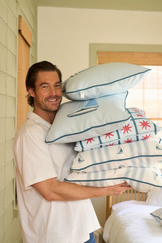 Craig with Americana Collection pillows on display.