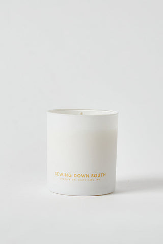 The 2 for $40: No. 5 Candle + Room Spray Bundle features a white sugar cookie candle in a minimalist glass jar labeled Sewing Down South, Charleston, SC in gold, shown on a plain white background.