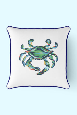 The Outdoor King Crab Pillow with Navy by Sewing Down South™ features a colorful abstract crab design in green, blue, and orange on a light blue background. Its framed with a dark blue border and made from durable SDS Shield® Outdoor Fabric.