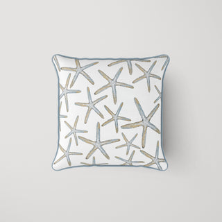 The Starfish Oversized Pillow is a square white throw pillow with a coastal chic pattern of blue and beige starfish, accented by light blue piping, inspired by the signature Sewing Down South™ design.
